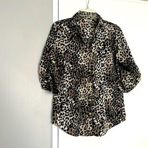 Mileage long sleeve button down animal print top for women. Size L